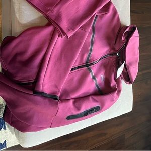 Selling a purple Nike tech brand new